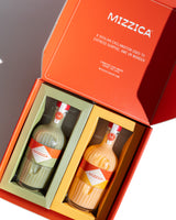 Two Mizzica liqueur bottles in a branded gift box.