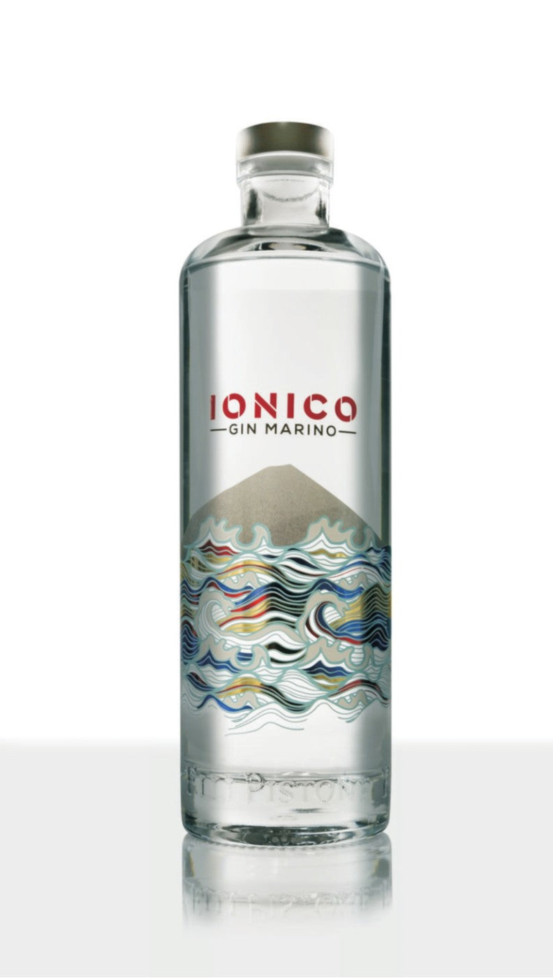 Clear glass bottle of Ionico Gin Marino on a white background